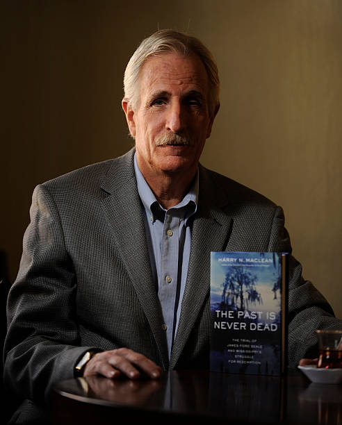 Harry MacLean, a Lincoln boy who grew up to be a best-selling true crime author, with the copy of his book about an infamous Mississippi murder. His book about a murder and repressed memories has been turned into a Showtime docuseries that he narrates.