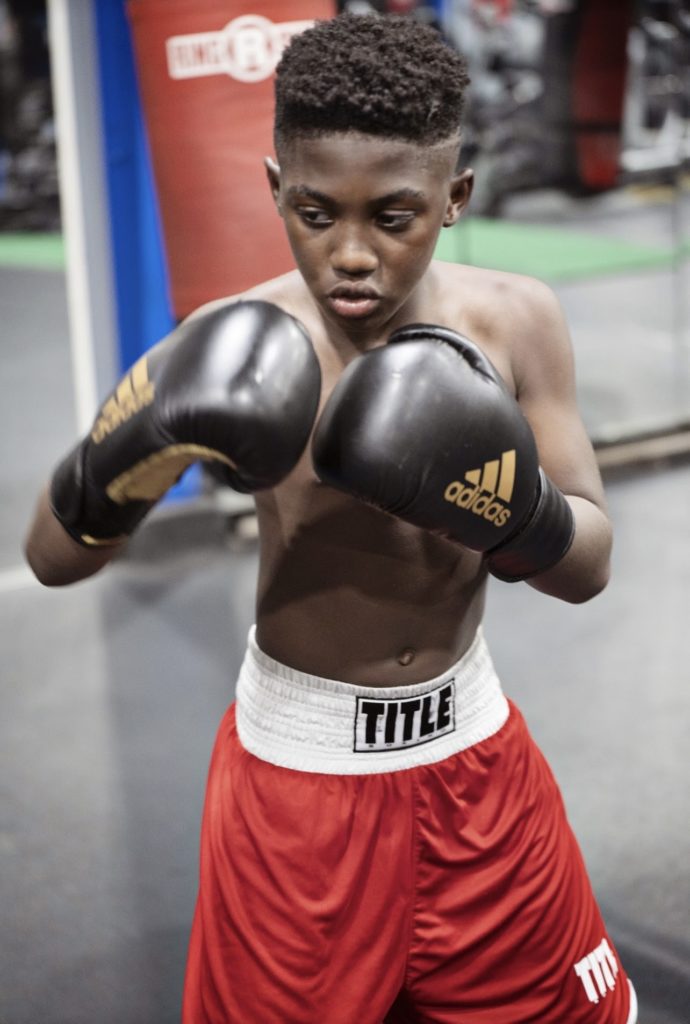 In North Omaha, Bud Crawford mentors young fighter. “He reminds me