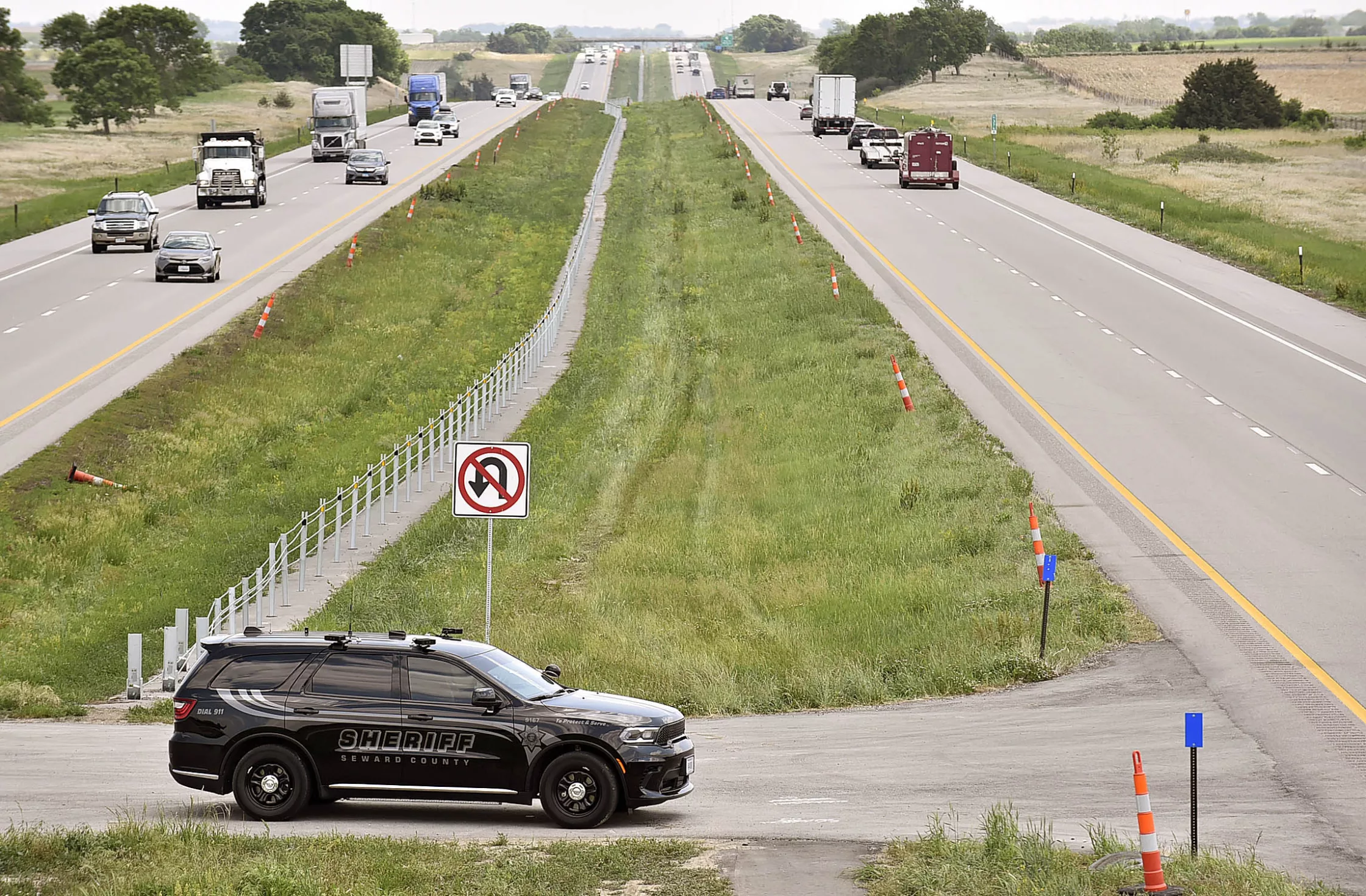 A Seward County Deputy in a subtly marked K-9 unit monitors eastbound traffic on Interstate 80 just east of the 322nd Road overpass on Wednesday May 24. Photo by Eric Gregory for the Flatwater Free Press.